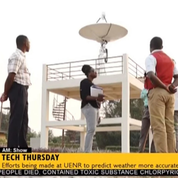 Technical team working at a satellite antenna