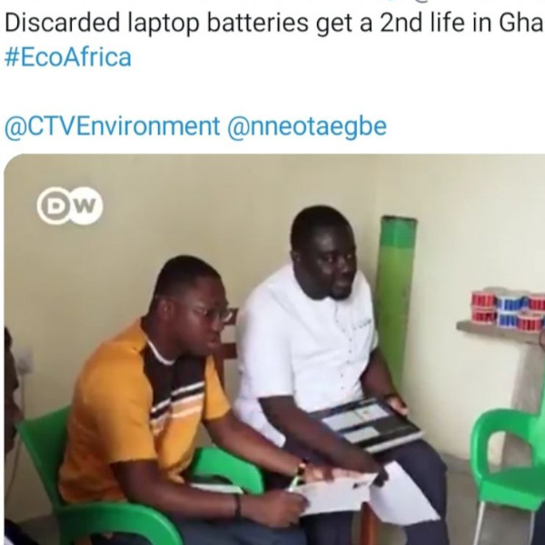 Engineers demonstrating a battery-based home-backup prototype