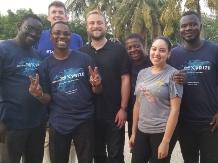 Members of an ocean-discovery engineering team standing together
